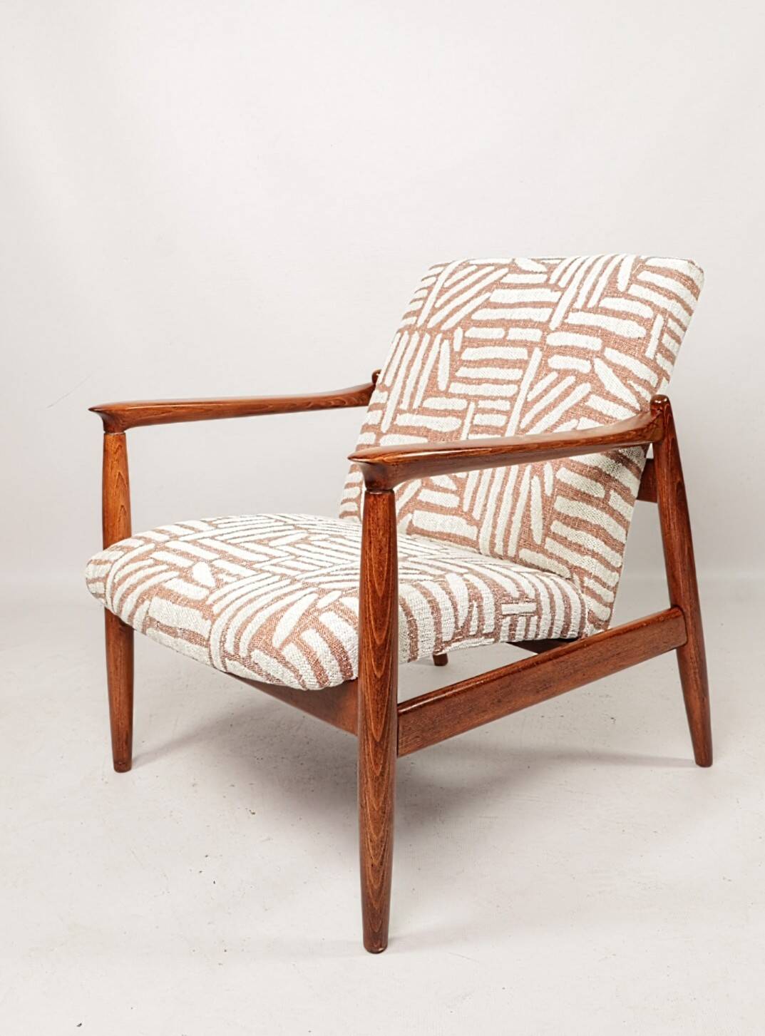 Mid-century modern armchair in coral red jacquard by E. Homa