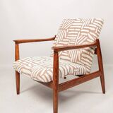 Mid-century modern armchair in coral red jacquard by E. Homa