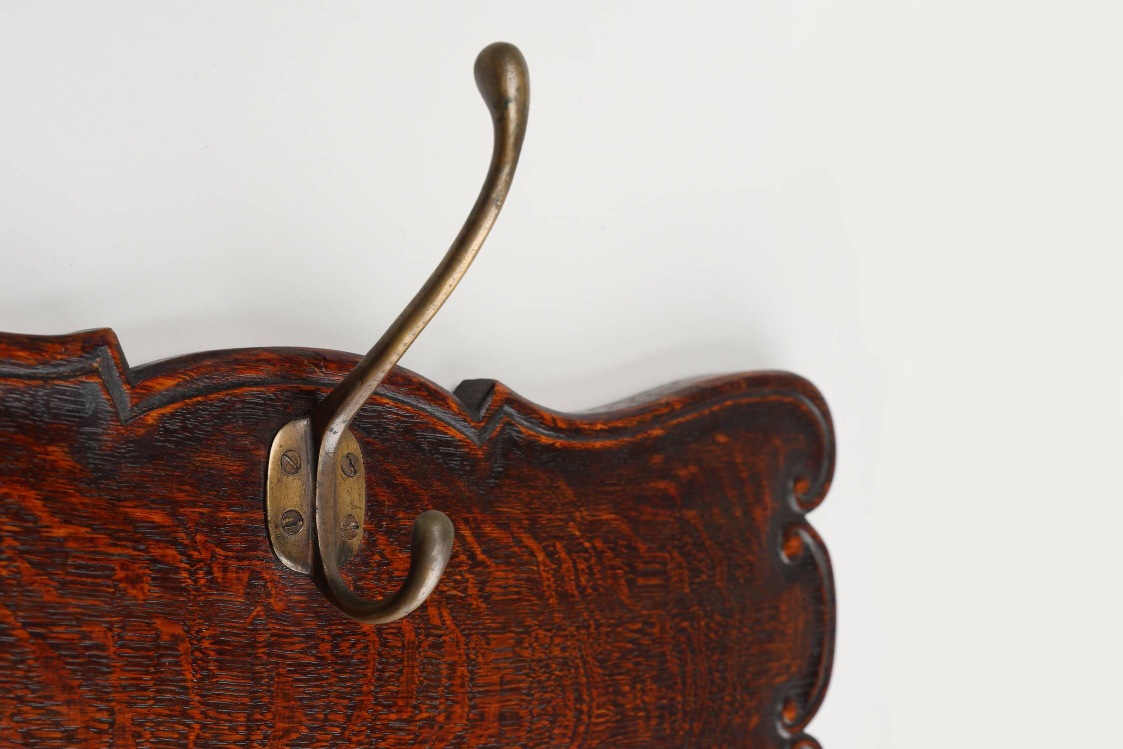 Art Nouveau style coat rack in oak with brass hooks, France ca. 1915