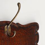 Art Nouveau style coat rack in oak with brass hooks, France ca. 1915