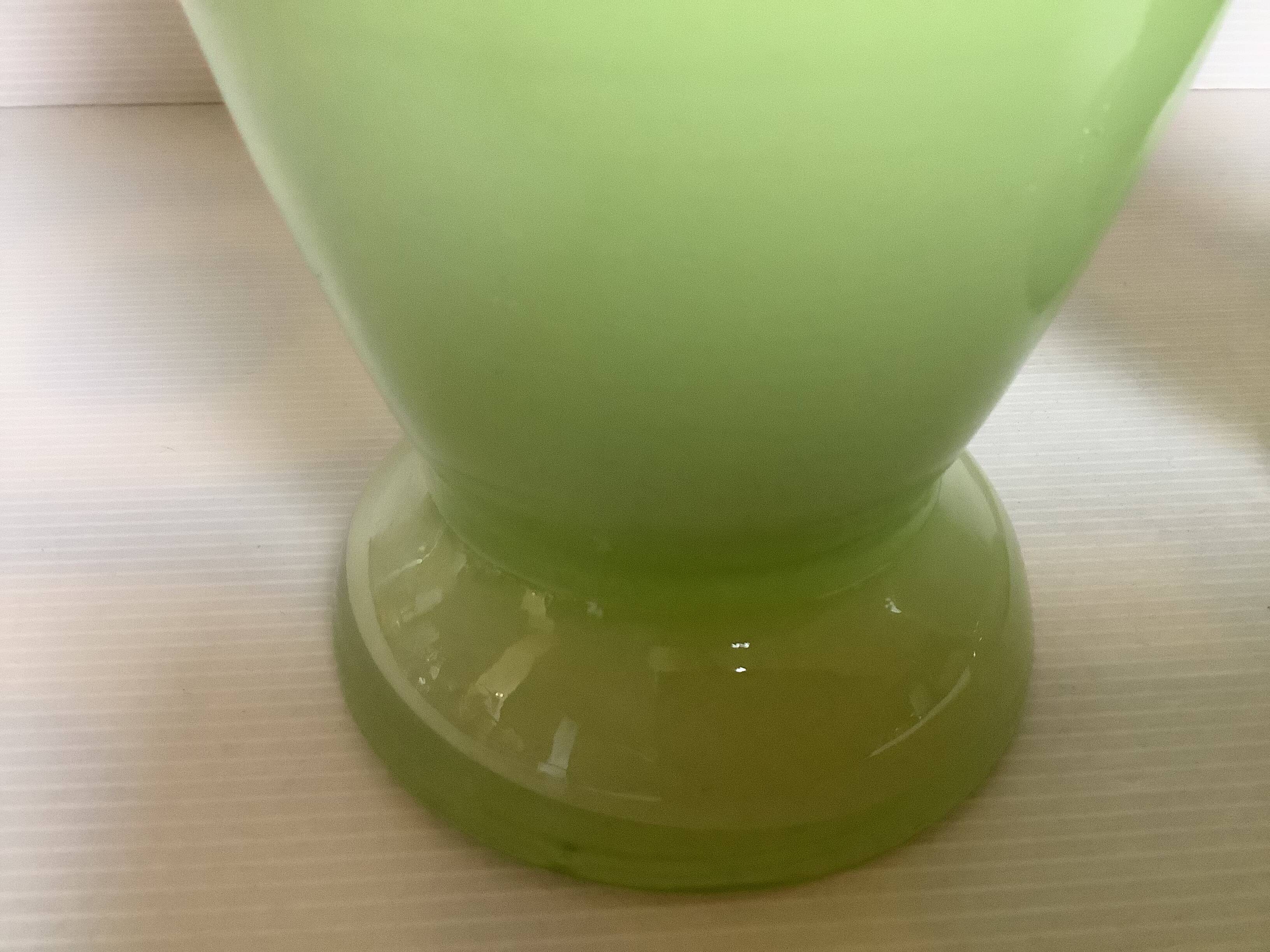 Pair of green glass paste vases