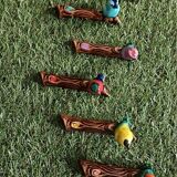 Set of six barbotine bird knife rests