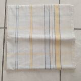 White tablecloth, yellow stripes in light linen.