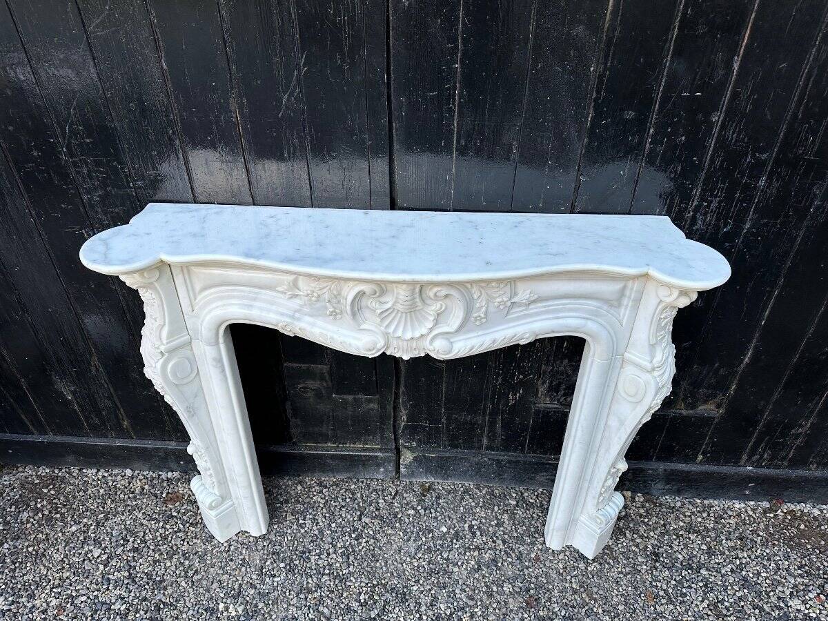 Louis xv style fireplace in carrara marble, circa 1980
