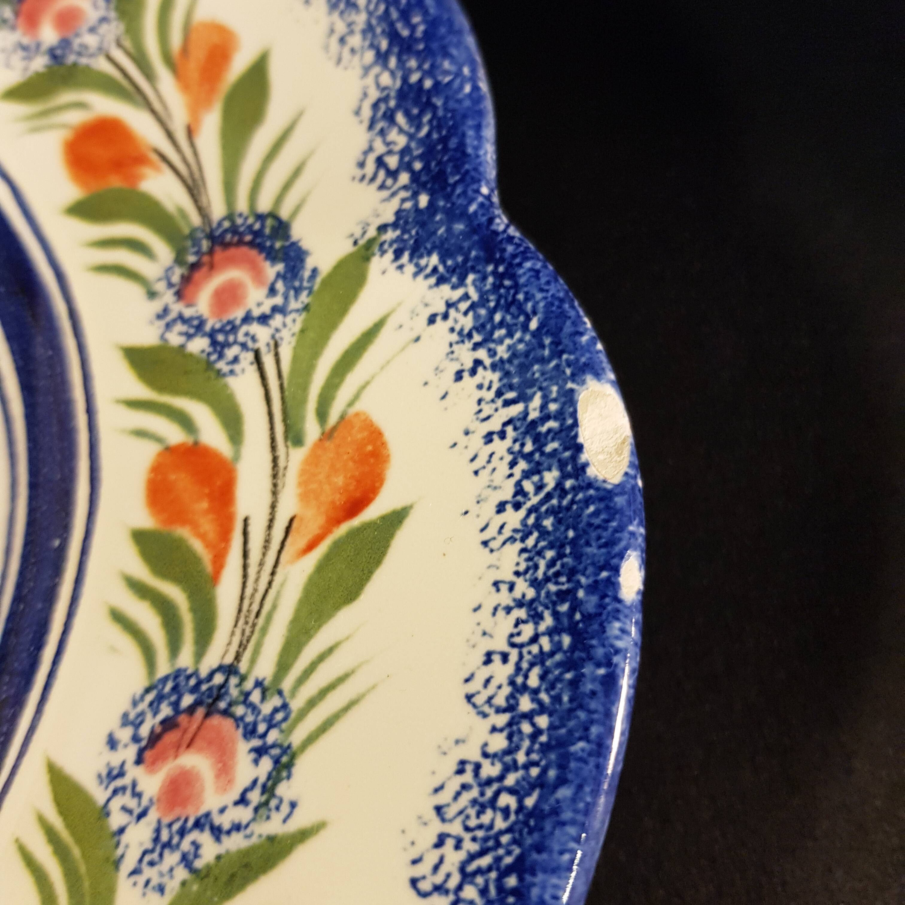 Vegetable soup tureen on Henriot Quimper display dish