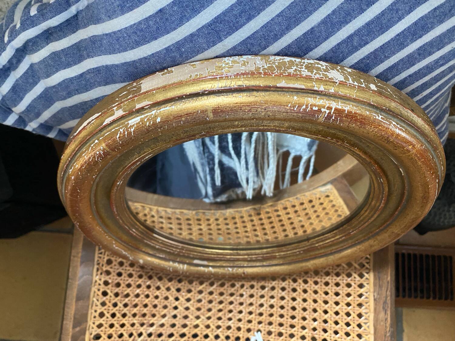 Miroir rond en bois doré ancien