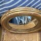 Miroir rond en bois doré ancien