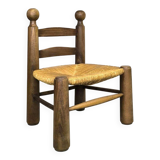 Vintage low chair in wood and straw