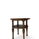 Petite table basse en noyer sculpté années 1920