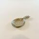 Empty pineapple pocket in silver metal
