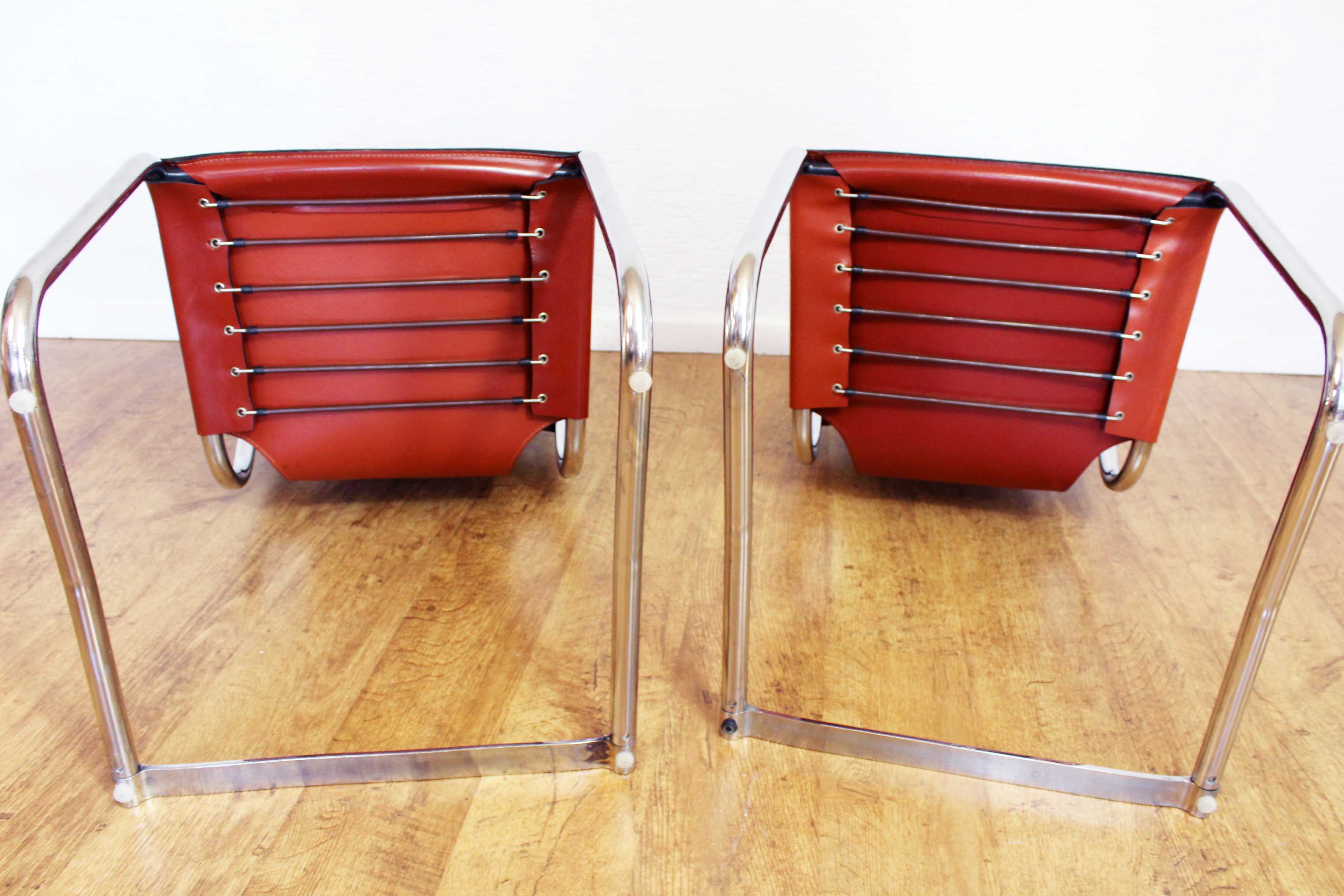 Pair of chairs in leather and chrome tube