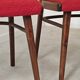 Set of 4 red dining chairs by Antonin Suman for Interier Praha.