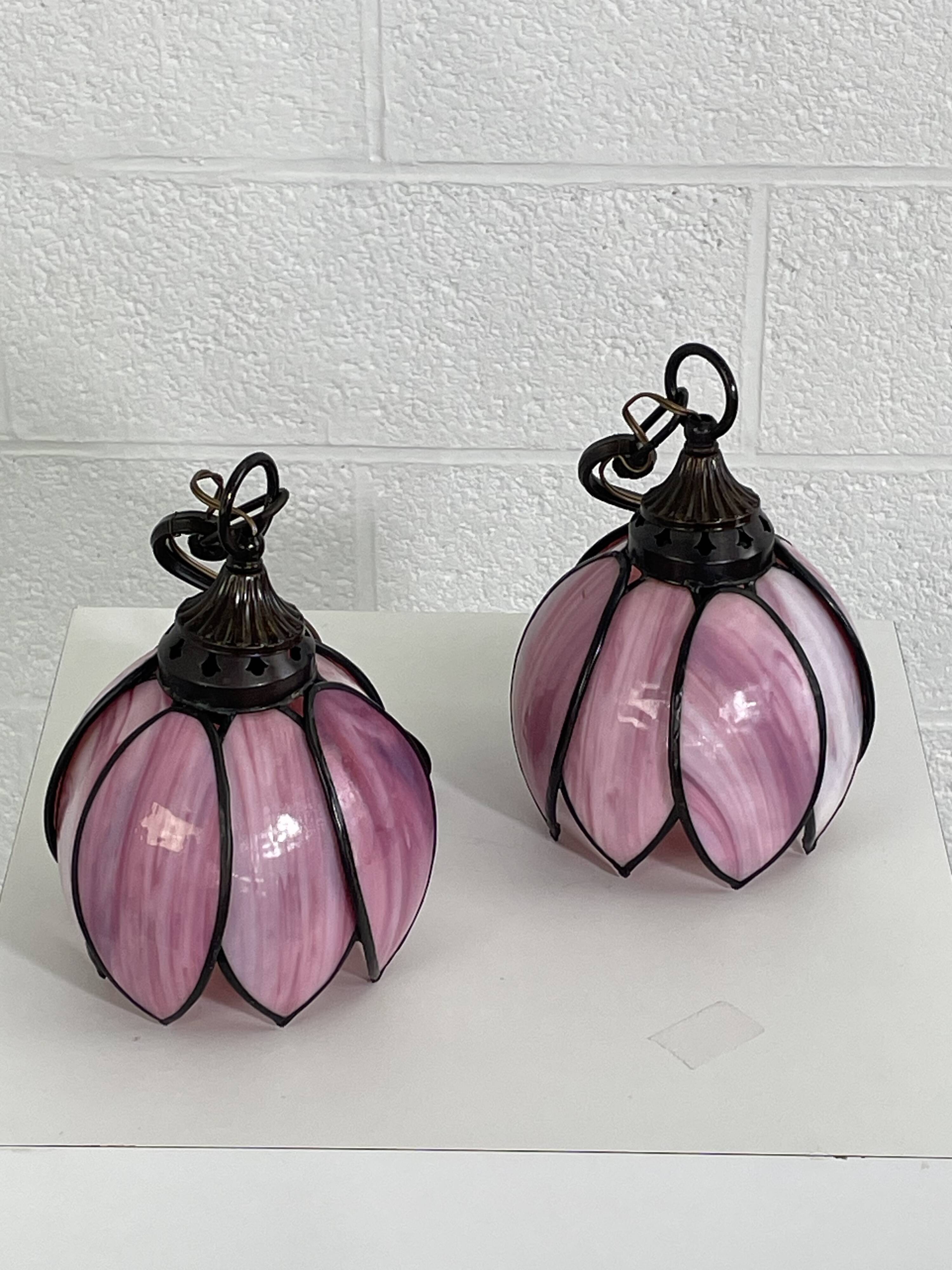 pair of iron wall lamps and Tiffany style glass legs