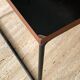 Black "flying" coffee table by Pierre Guariche for Steiner