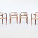 Niels Otto Moller model 66 armchairs teak and paper cord Denmark 1974