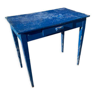 Blue-painted wooden table with drawer