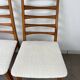 4 Scandinavian chairs, teak with boucle seats.