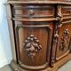 Buffet deux-corps de pavillon de chasse en noyer sculpté style Re