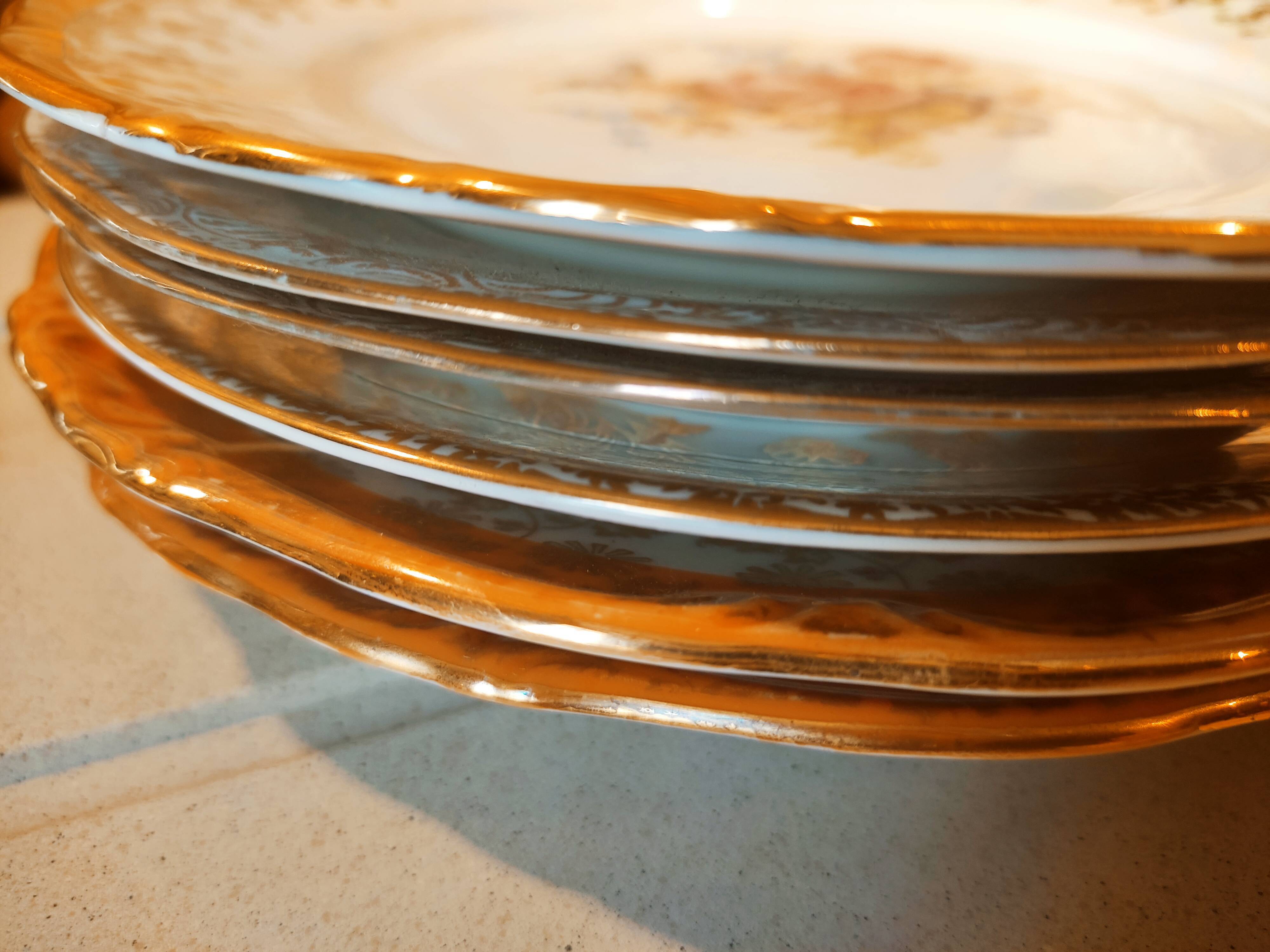 6 mismatched dessert plates decorated with roses