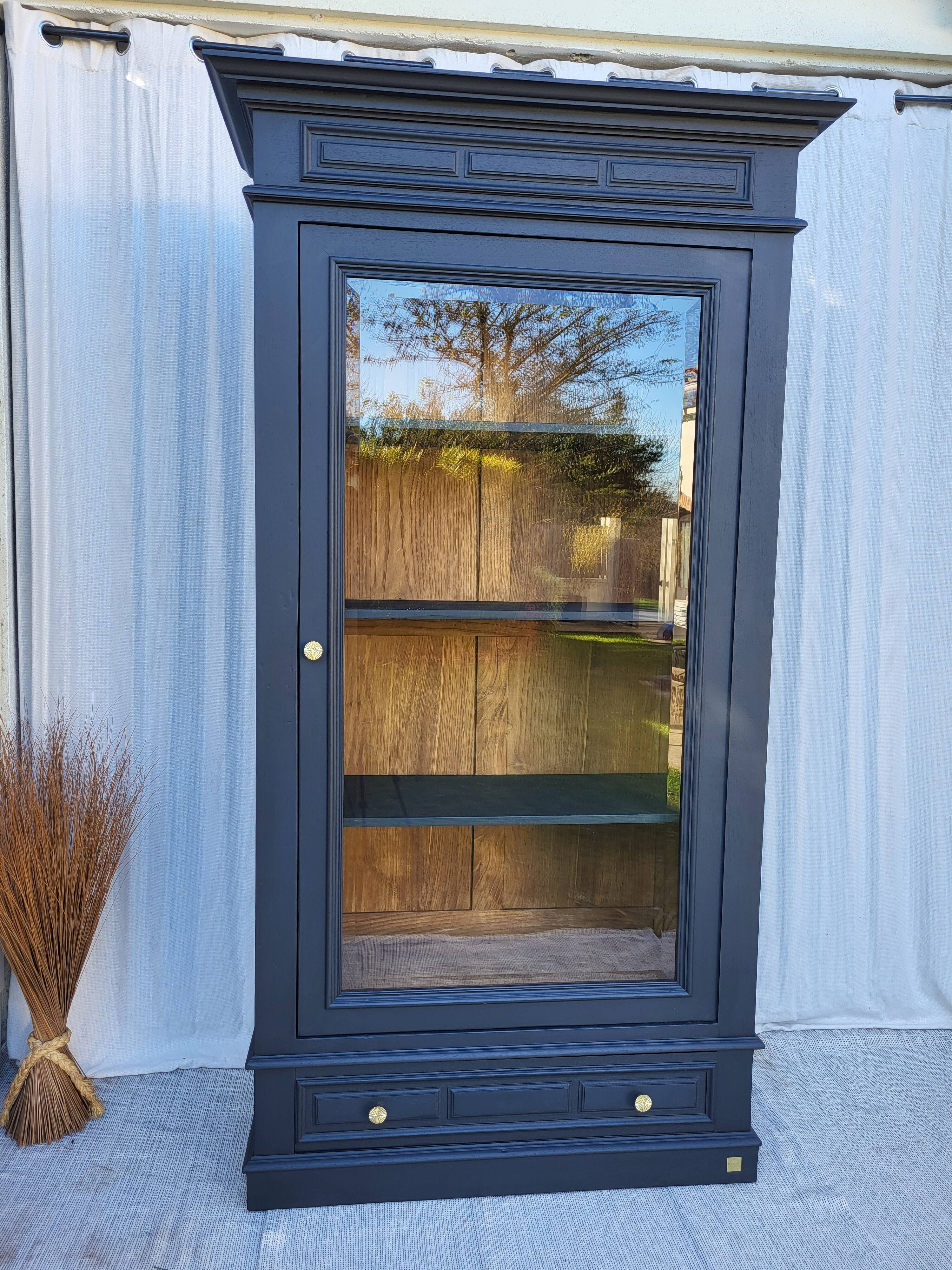 Black and raw wood dresser