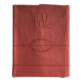 Old linen and cotton sheet in brick red