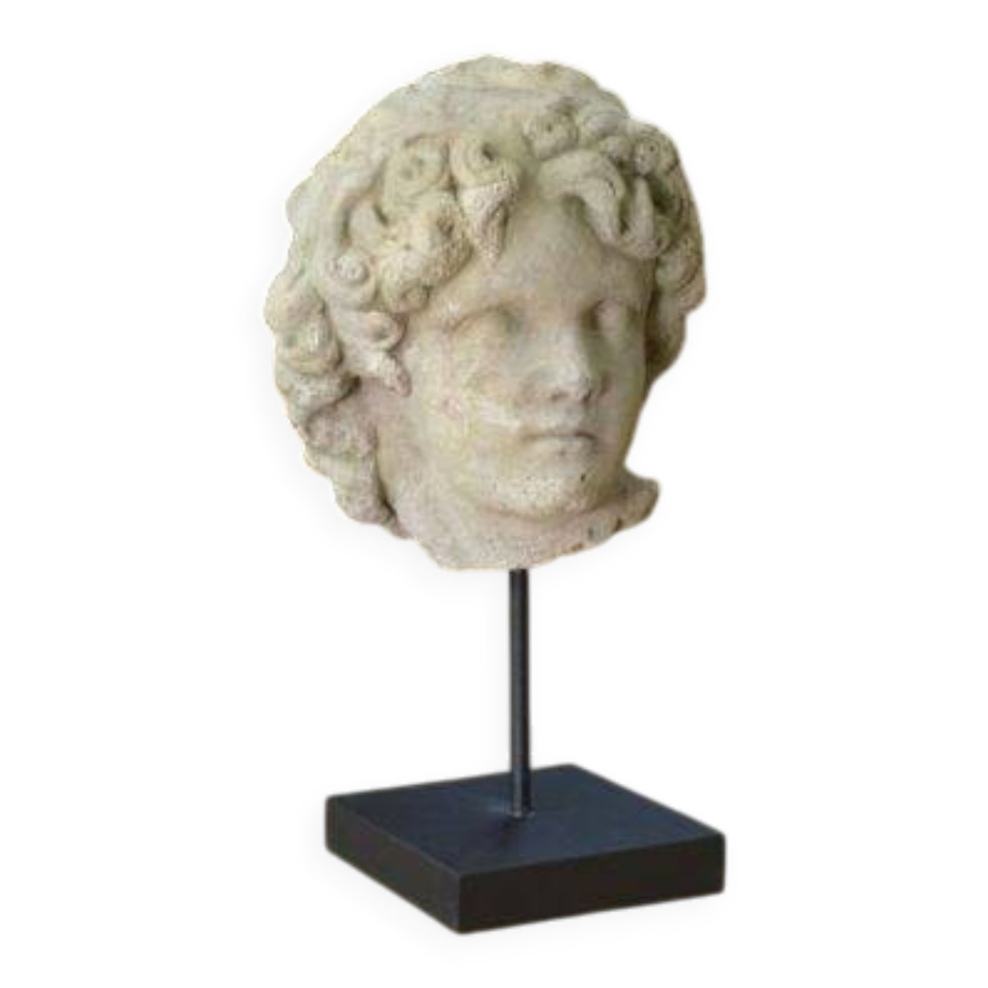 Sculpture of a head in reconstituted stone carved in the antique style of the 19th century