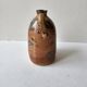 Ceramic handle soliflore vase with an unidentified signature