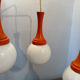 Suspension cascade design Space age orange vintage from the 70s.