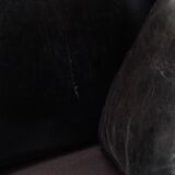 Luxurious and comfortable sheepskin armchair in a unique, stately black color