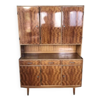 Vintage brown wooden wardrobe from the 1960s, mid-century design with a niche and drawers.