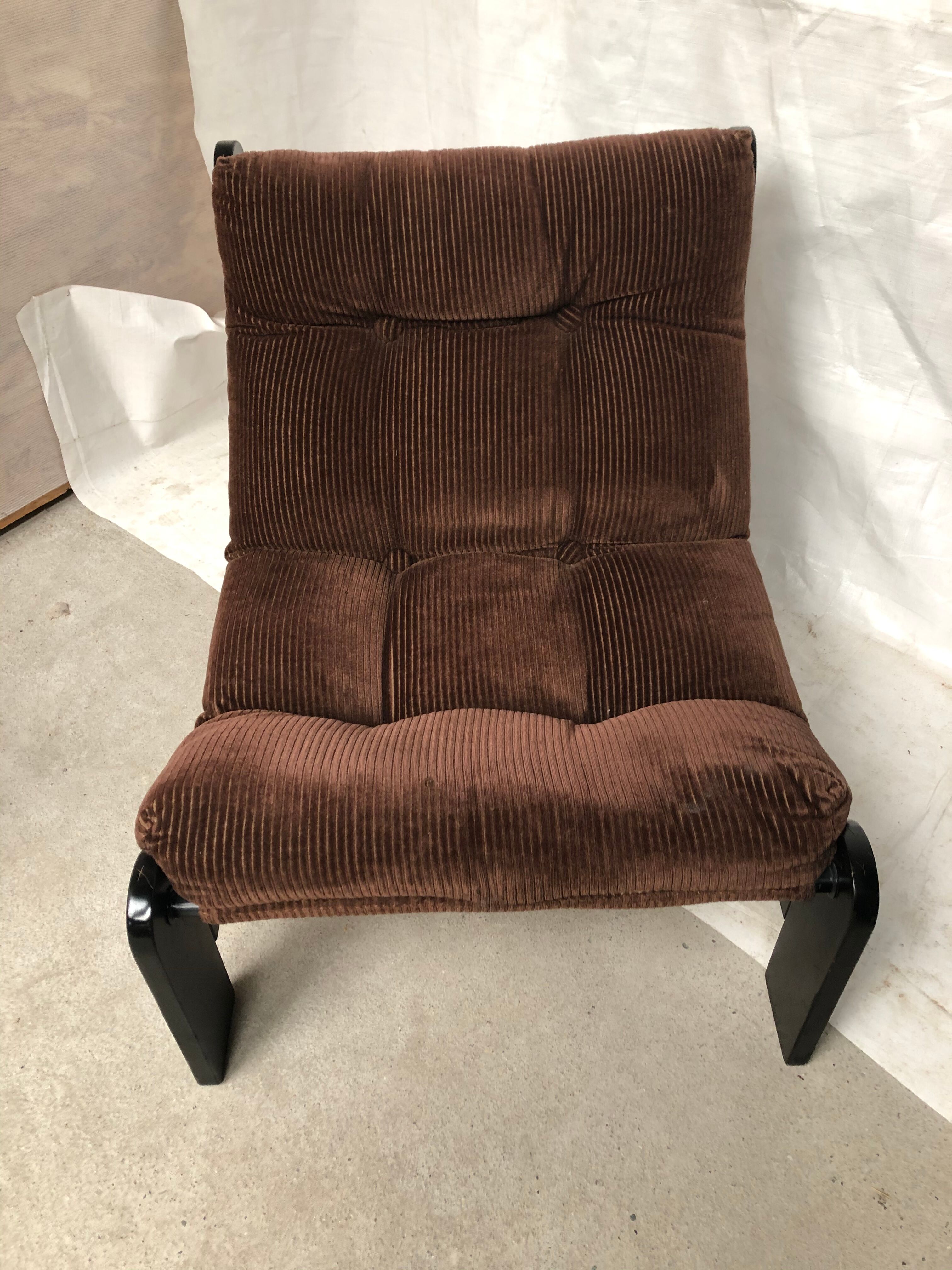 Modernist armchairs wood heaters and brown velvet vintage 70s