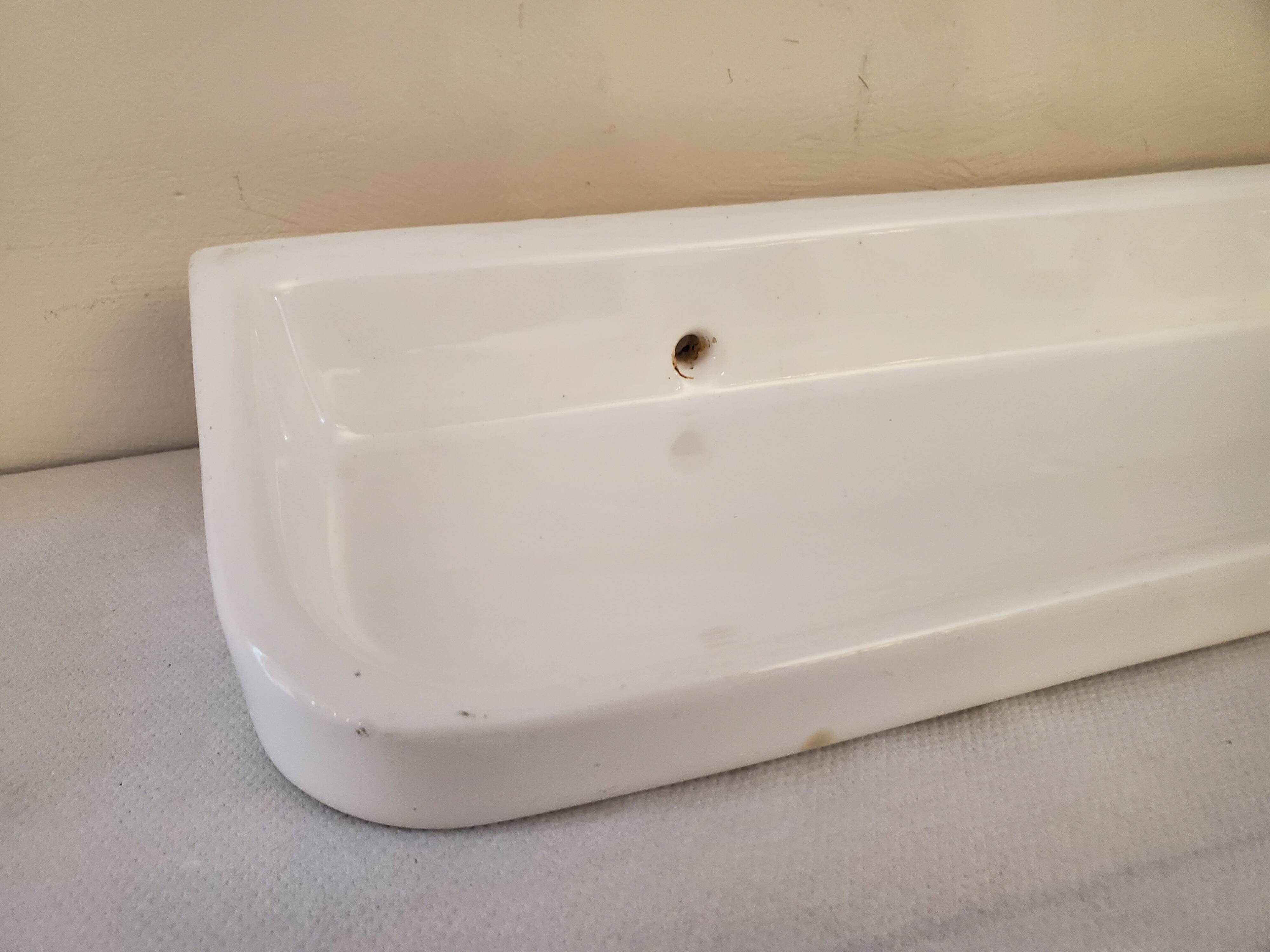 White ceramic bathroom shelf