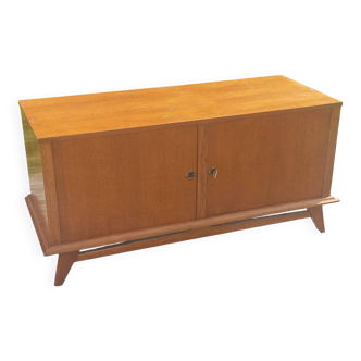 Vintage oak sideboard with splayed legs from the 1950s.