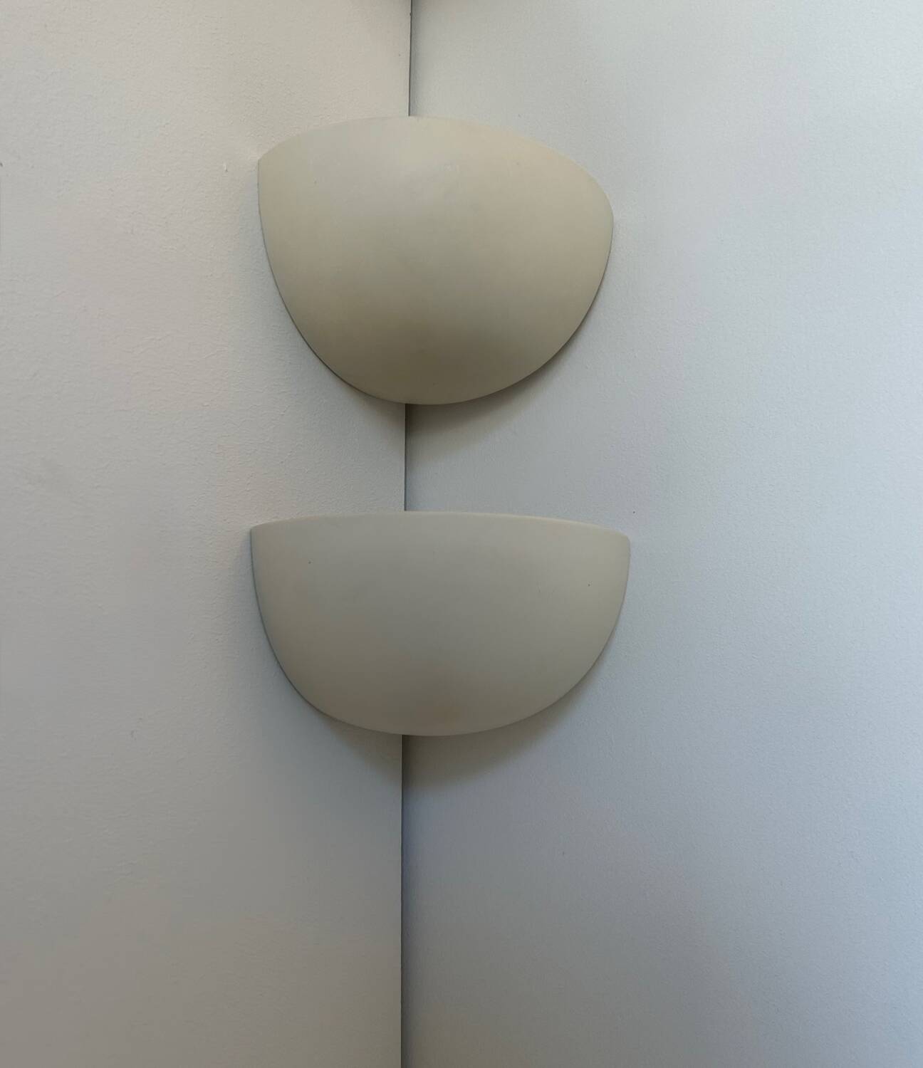 Pair of vintage corner sconces, matte white porcelain, France 1970