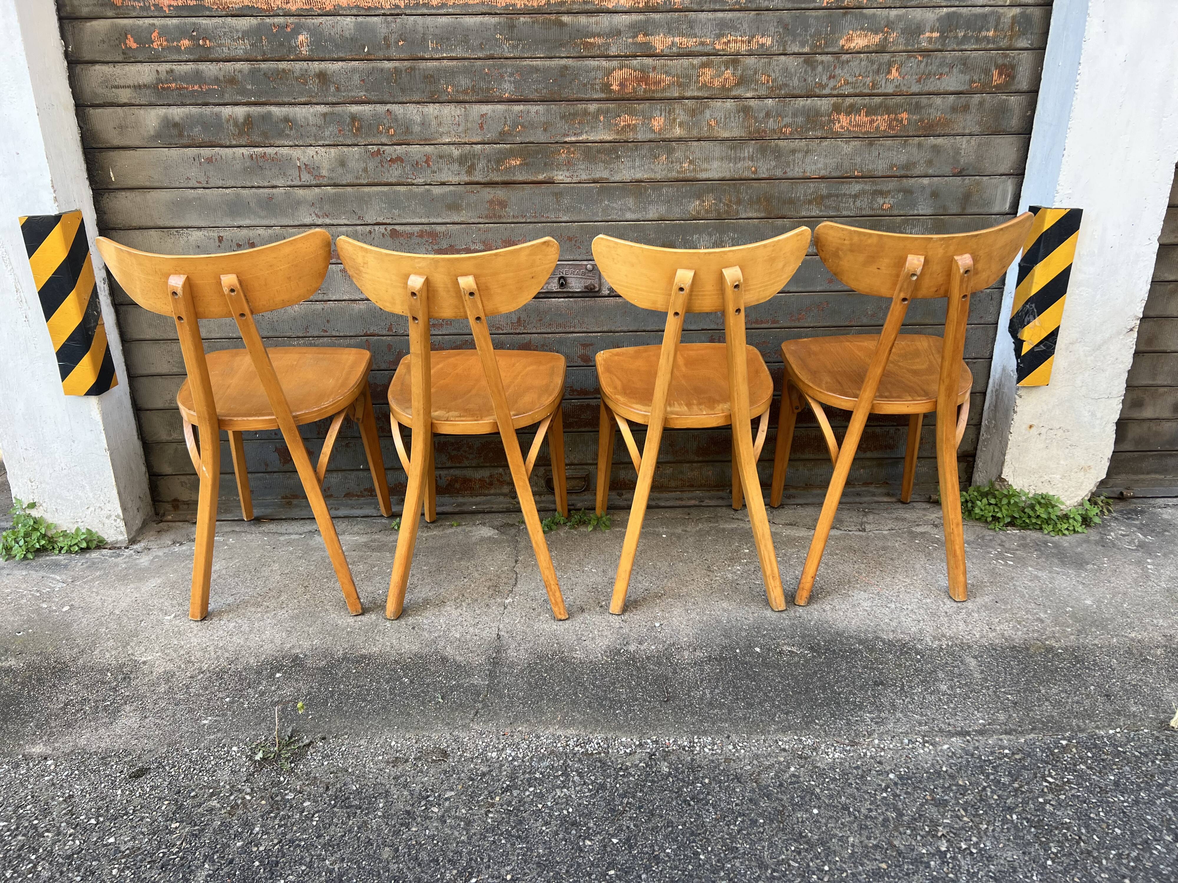 Suite de 4 chaises « banane » Lutherma