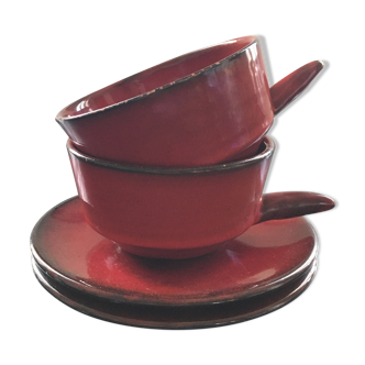 Pair of red cups and saucers