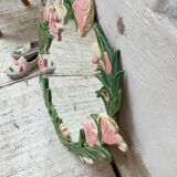 Oval ceramic mirror with flowers