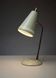 Lampe de table orientable en laiton patiné et métal vert