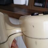 Clock and mechanical alarm clock Rhythm Made in Japan 70s space age
