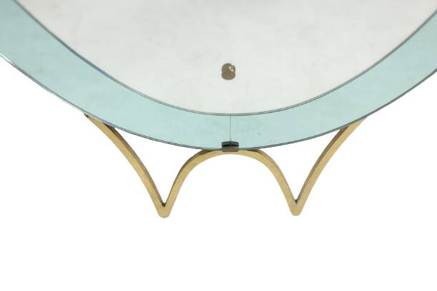 Two-tone glass console mirror with gilded brass. Circa 1950.