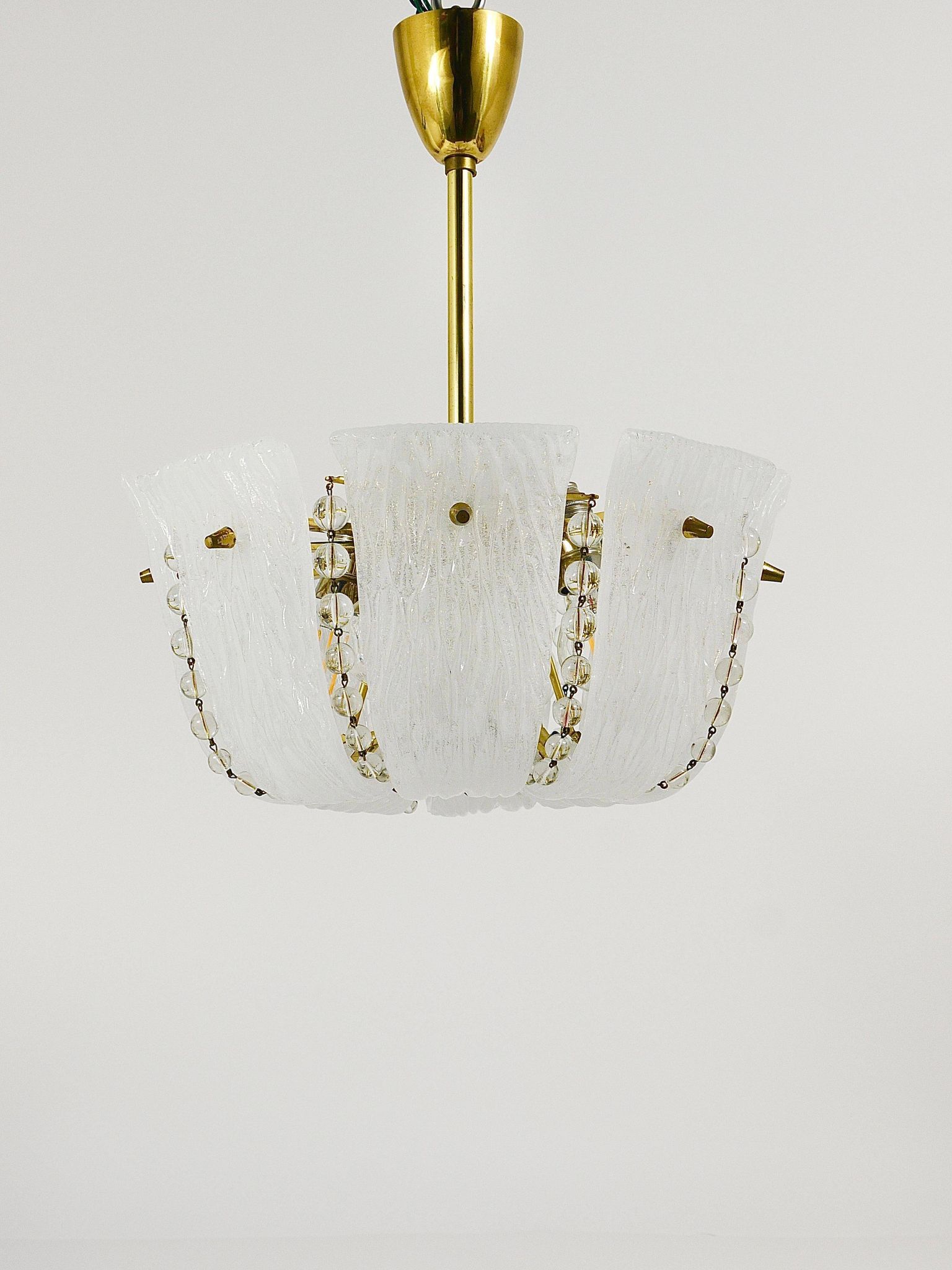 J.T. Kalmar Petite curved suspension basket, brass and glass, Austria, 1950s