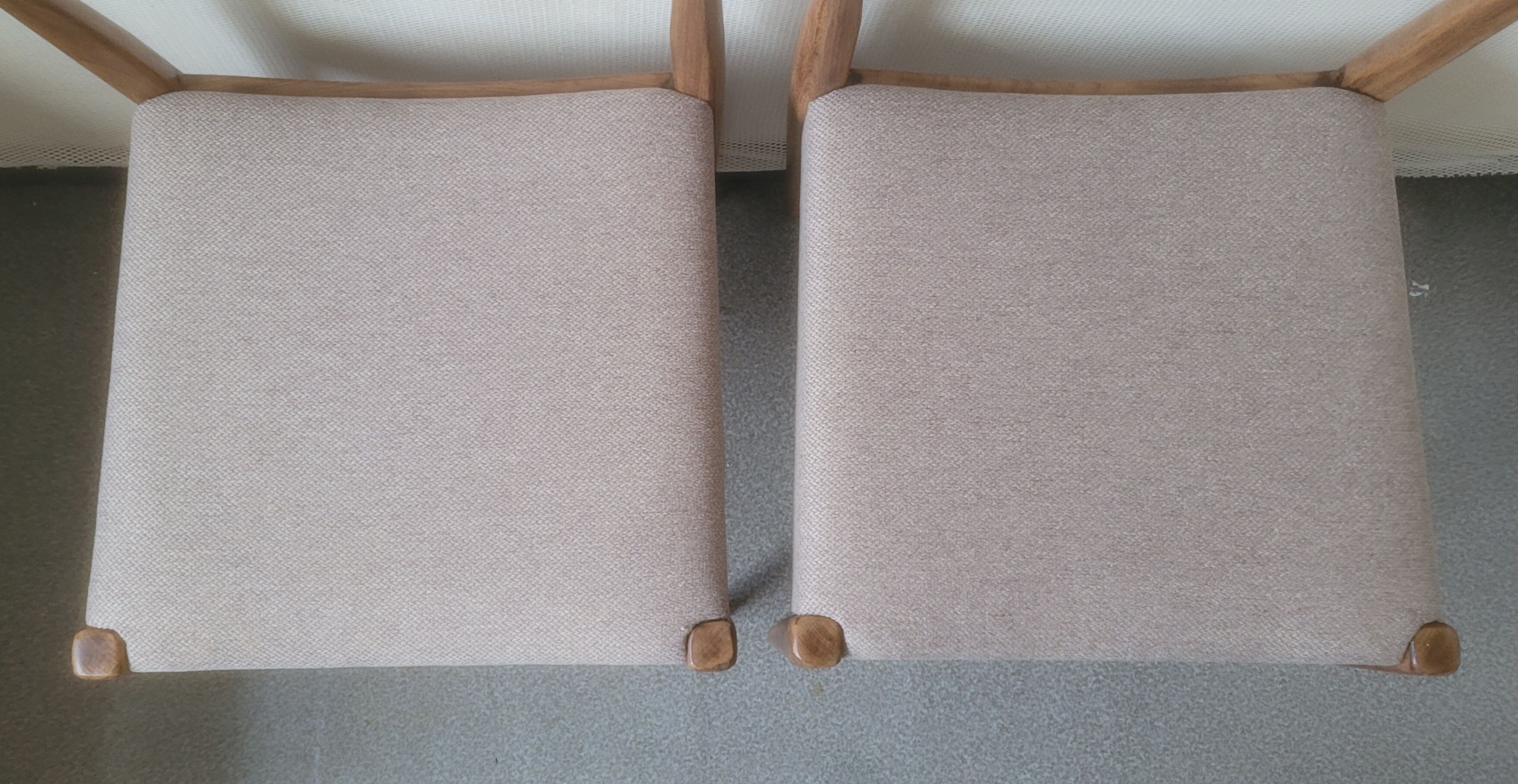 Pair of Scandinavian teak chairs sitting beige gray fabric