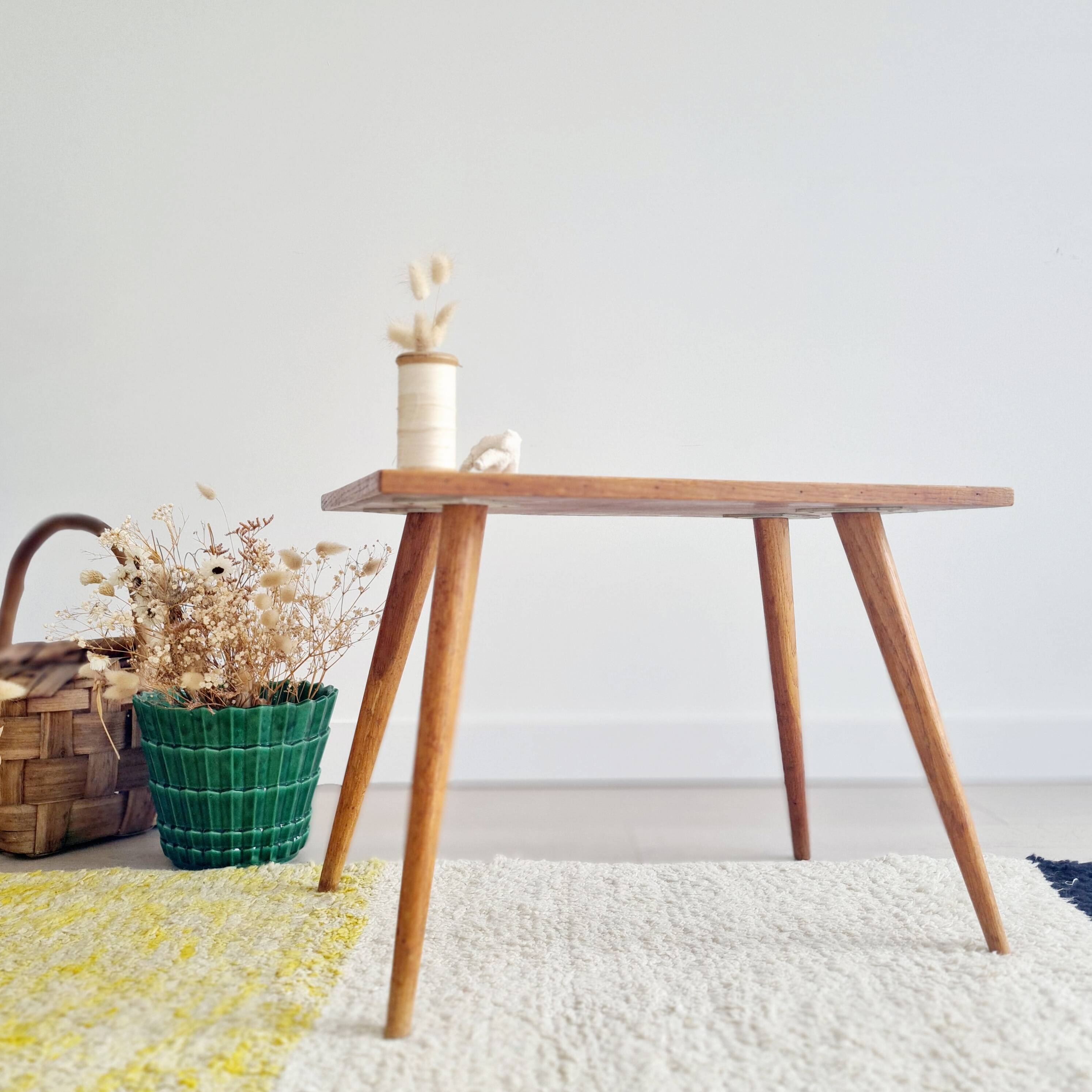 Antique coffee table with compass legs