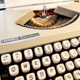 Blue green baby hermes typewriter