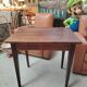 Small patinated solid wood side table with tapered legs - 1900