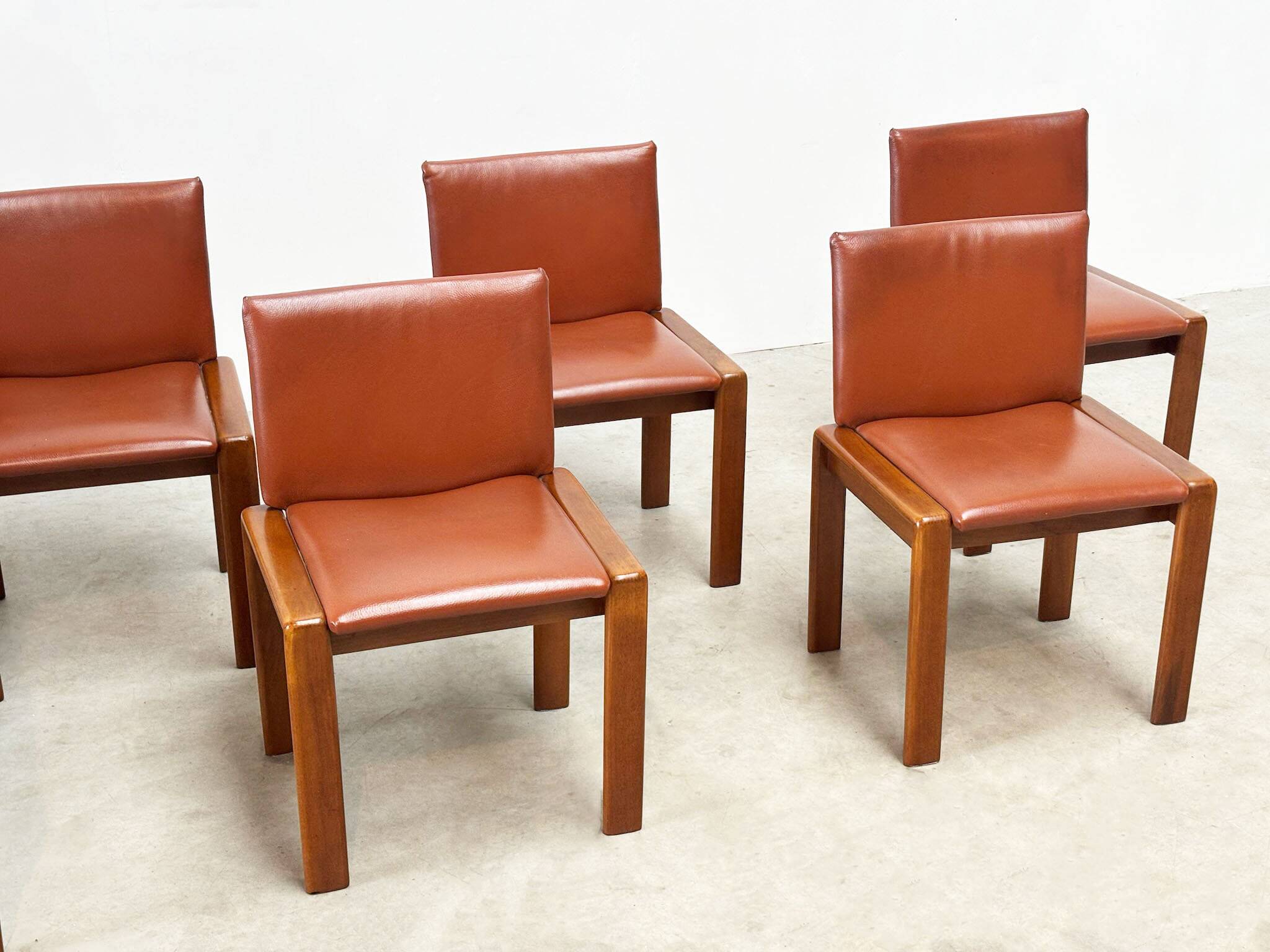 Set of six leather Italian dining chairs