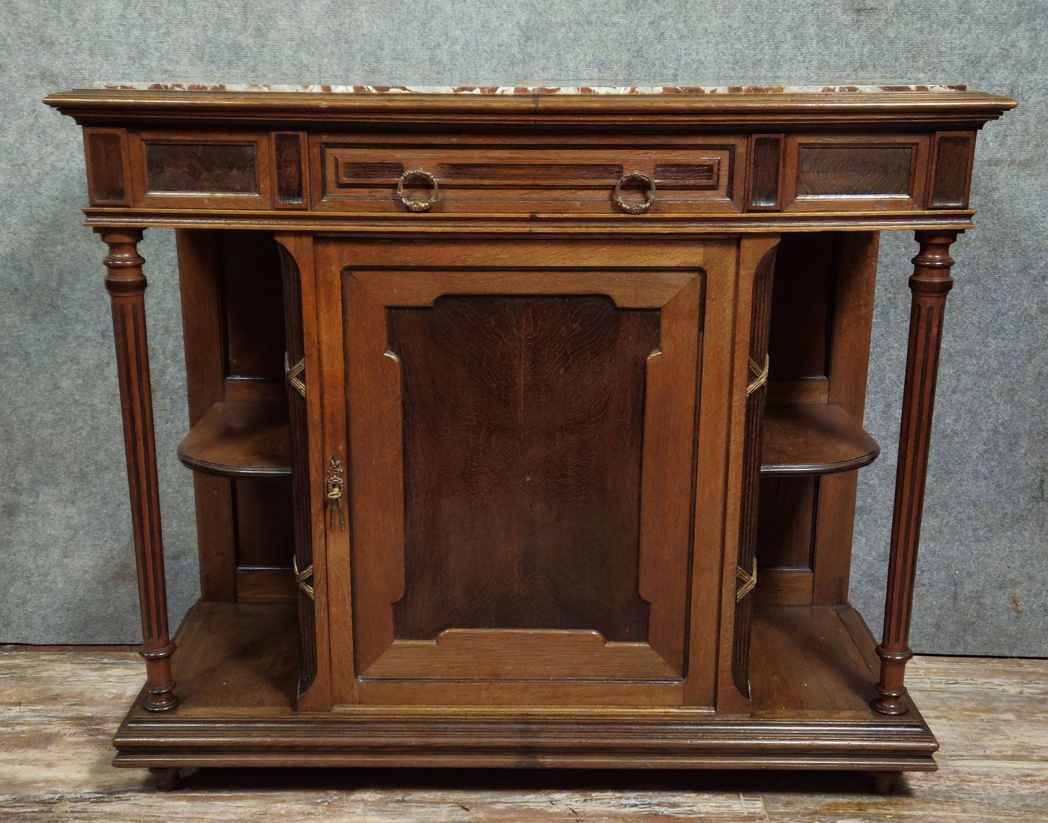 Antique low furniture of the buffet / sideboard / serving table type in Louis XVI style.