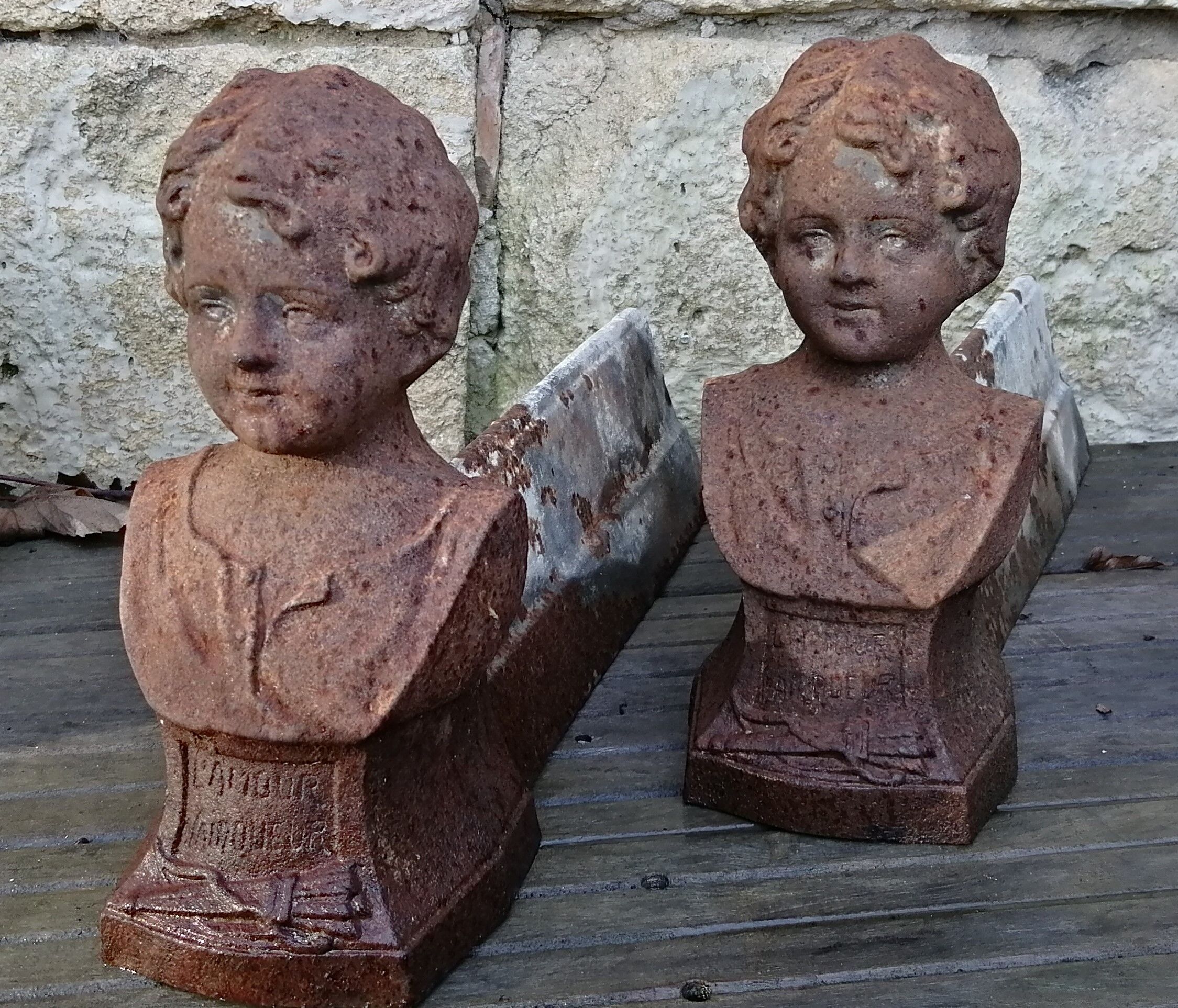 Pair of cast iron fireplace chenets "Children"