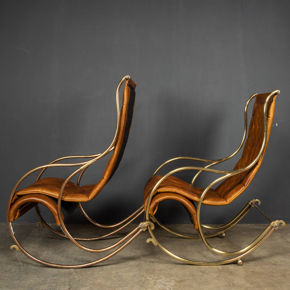 Mid 20thc british made pair of leather rocking chairs c.1950