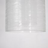 Doria pendant lights in lined frosted glass.